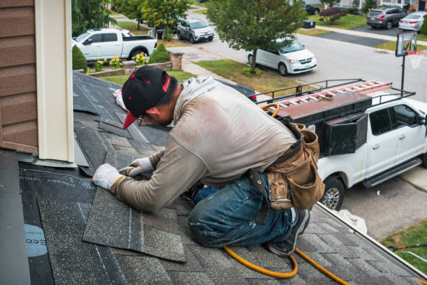 Professional Roof Replacement technician working in Pointblank, TX